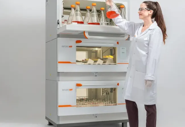 Infors Multitron 3-stacked with person